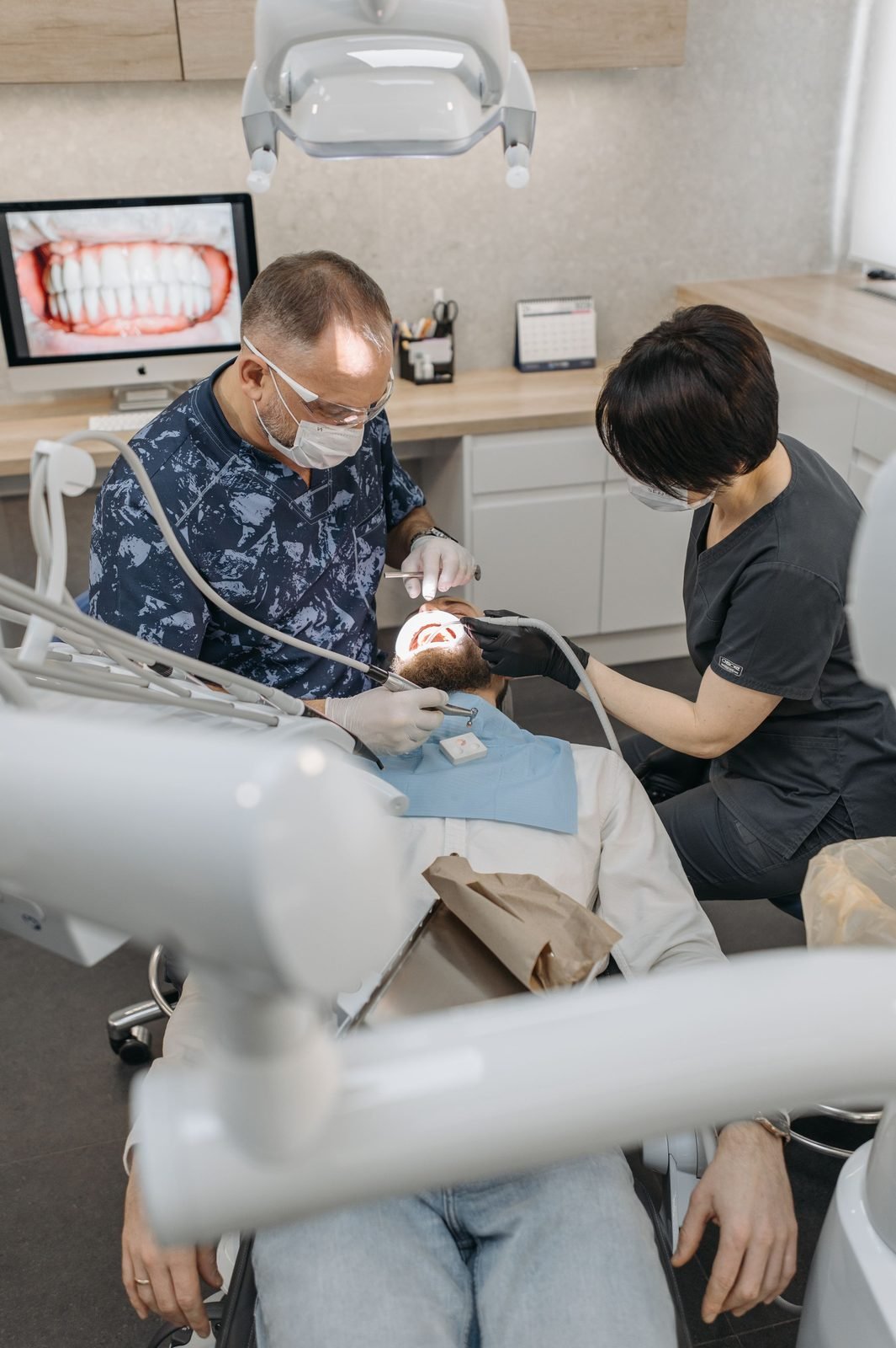 Two dentists reviewing a scan together.